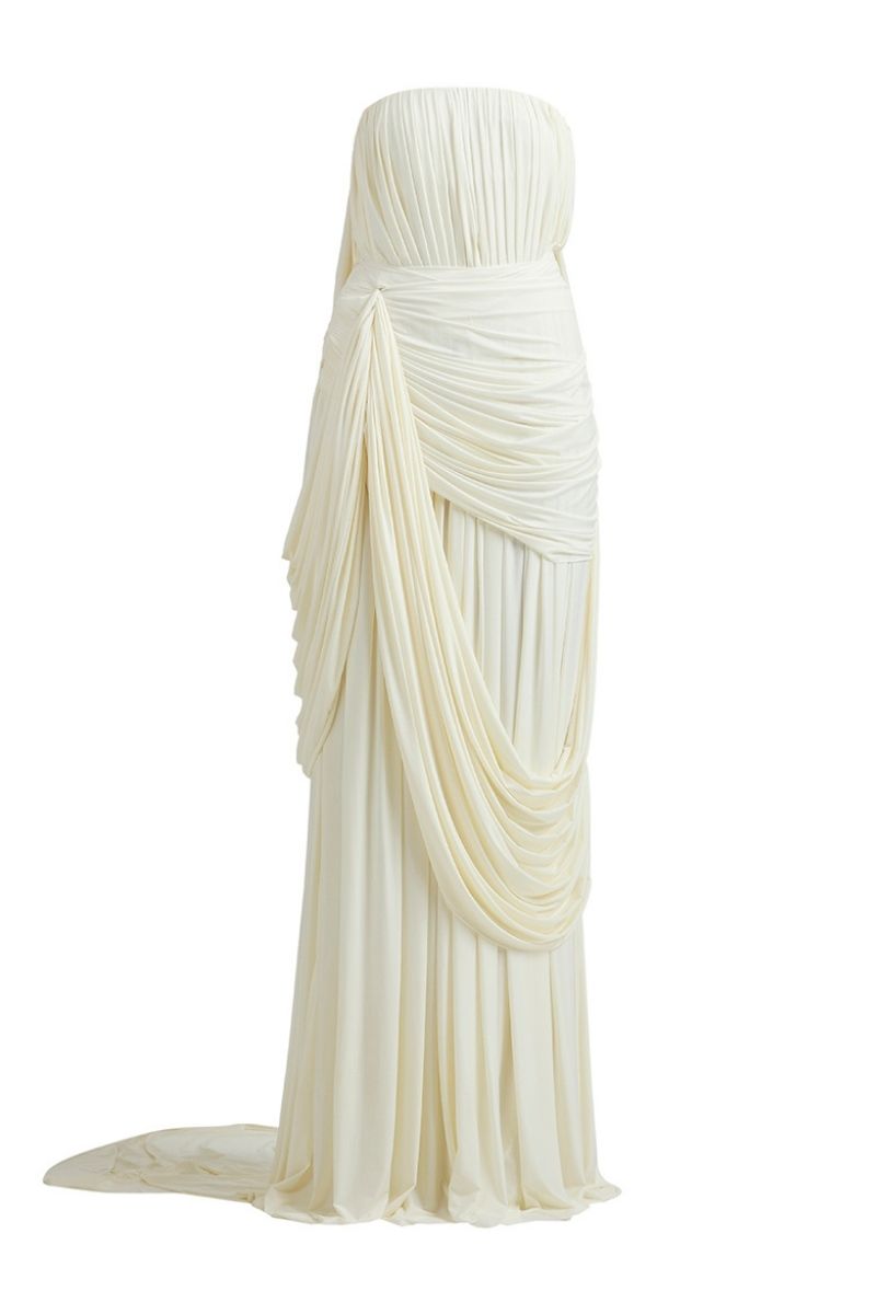 Deme By Gabriella Naomi maxi dress in off-white with flowing fabric and elegant design, perfect for summer or special occasions.