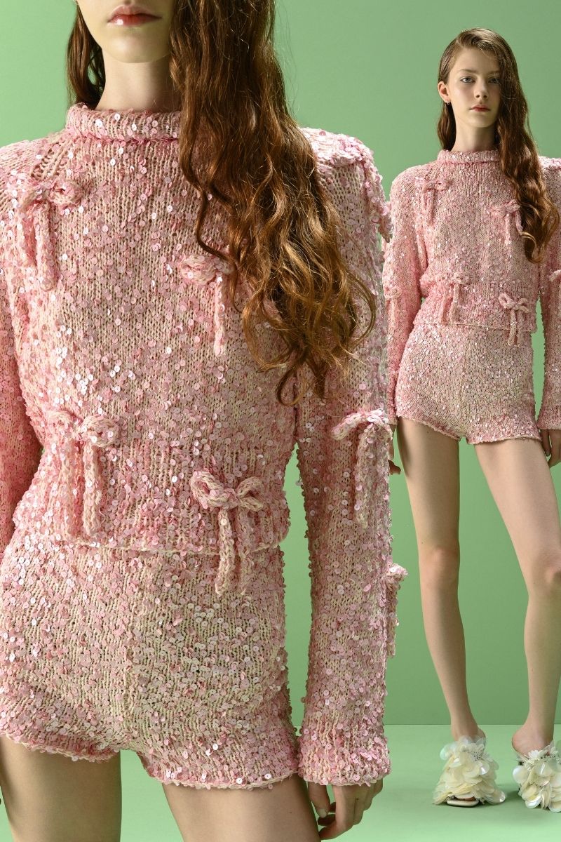 Lalo Salue long sleeve pink sweater with a cozy, fitted design, perfect for casual or layered outfits.