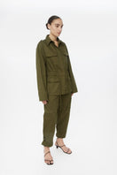 Canvas cotton jacket by Dāl the Label, shown in a stylish, casual fit with front pockets and a button-up front.
