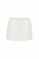 White minimal skort from Keira Tong, featuring a sleek mini design and clean silhouette, perfect for modern casual wear.