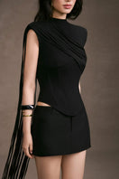 Black minimal skort by Keira Tong, showcasing sleek shorts with a minimalist design and subtle styling details.