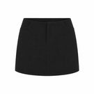 Black minimal skort by Keira Tong, stylish shorts with a sleek, minimalist design perfect for casual or sporty outfits.