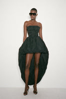 Black Nué Grace mini dress featuring a fitted silhouette and elegant design, perfect for stylish occasions.