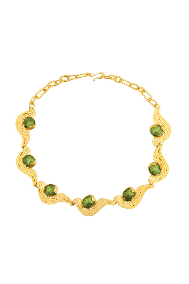 Green meteorite necklace by Jude Benhalim featuring a polished meteorite pendant on a delicate chain.