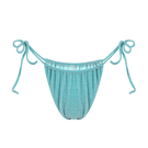Bright turquoise Suncillo Virna sparkly bikini bottom with shimmering details, styled for beach or poolside wear.