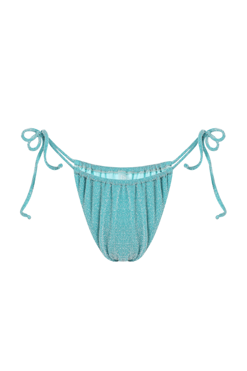 Bright turquoise Suncillo Virna sparkly bikini bottom with shimmering details, styled for beach or poolside wear.