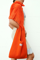 La Granni orange Mercado Portobello shoulder bag with sturdy straps and spacious interior, showcasing vibrant color and stylish design.