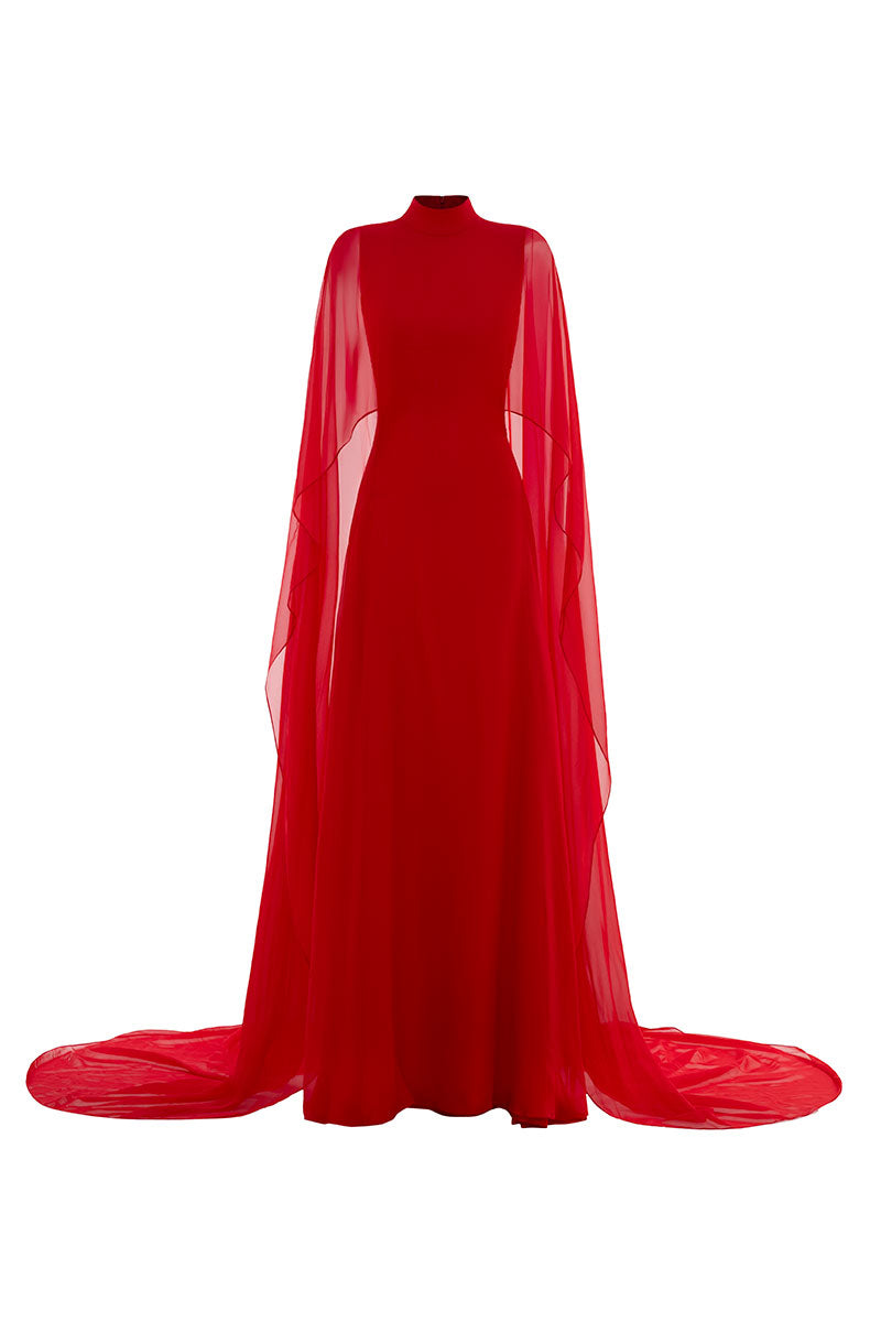 Le Thanh Hoa Scarlet Majesty gown with flowing red fabric and elegant design, displayed on a mannequin.