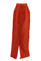 Aquarel Studio Lily maxi skirt in vibrant tangerine color, flowing fabric with a stylish, elegant silhouette.