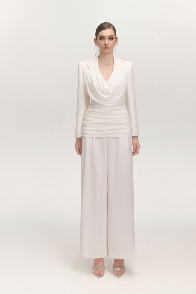 White JEMMIA top by Arti Apparel, featuring a sleek, fitted design perfect for casual or dressy outfits.
