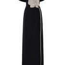Black Stone Orchid asymmetric shoulder gown with matching cape by Tracy Studio, featuring elegant draping and sophisticated design.