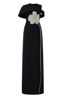 Black Stone Orchid asymmetric shoulder gown with matching cape by Tracy Studio, featuring elegant draping and sophisticated design.