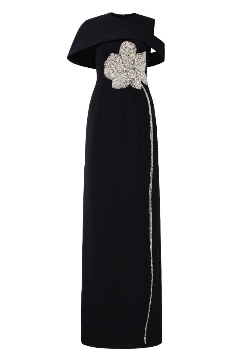 Black Stone Orchid asymmetric shoulder gown with matching cape by Tracy Studio, featuring elegant draping and sophisticated design.