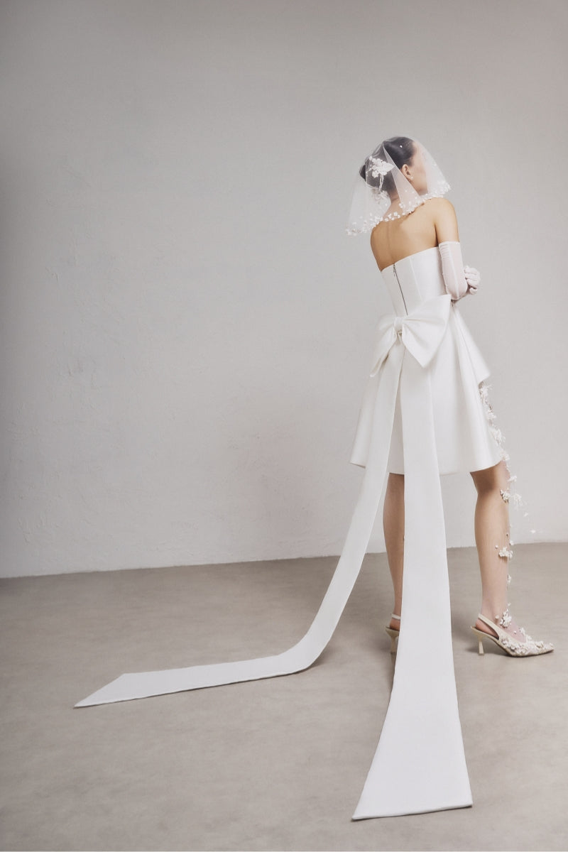 White Plan Jaspone mini dress featuring a stylish design and lightweight fabric, perfect for casual or summer wear.