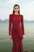 Red glitter stretch gown from Lune De Soie featuring a fitted silhouette and elegant design for formal occasions.
