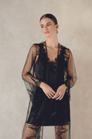 Black Alice robe by Entos, featuring a flowing, elegant design with long sleeves and a relaxed fit, ideal for lounging or sleep.