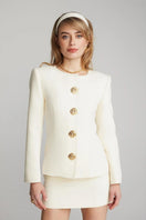 Nana Jacqueline Lisette white mini skirt made of lightweight fabric, styled with a fitted waist and short hem for a chic look.