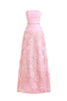 Pink strapless gown with floral details from Happy Clothing, featuring a flowy design and elegant style.