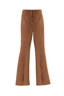 Kris Marán high-waisted suede pants in ginger color, tailored fit with a smooth texture, shown on a model.