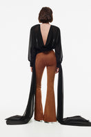 Kris Marán high-waisted suede pants in ginger color, showcasing their stylish fit and soft texture.