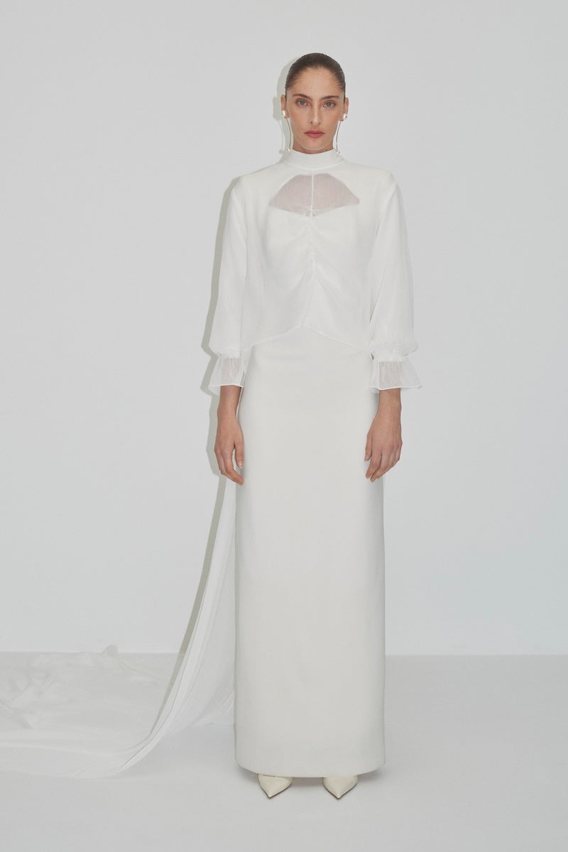 Elegant bridal cape in bambula silk featuring delicate detailing, designed by JC Pajares for a luxurious wedding cover-up.