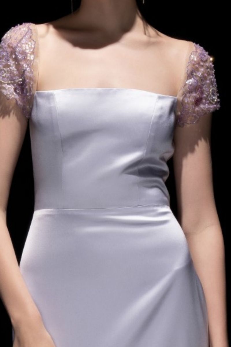 21Six Veri Peri Cara Silk Satin Gown with attached flowing skirt and elegant neckline, showcased on a mannequin.