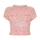 Lalo Salue Bow Sweater in pink, cozy knitted sweater with bow detail, perfect for stylish and comfortable everyday wear.
