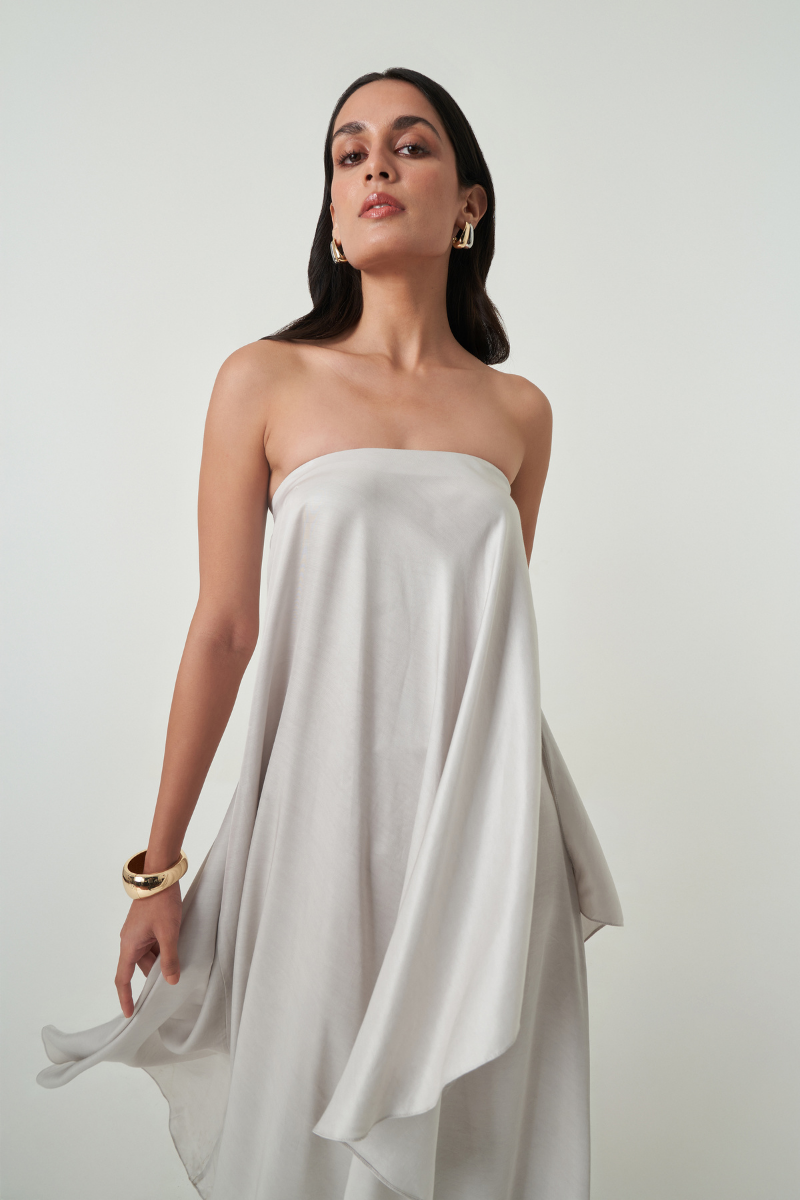 Summer Away Amal Gray Maxi Skirt with flowing fabric and waistband, styled for a casual or dressy look.