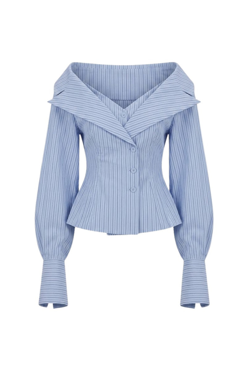 Bright blue Selena shirt by Keira Tong featuring a casual fit and lightweight fabric, displayed on a hanger.