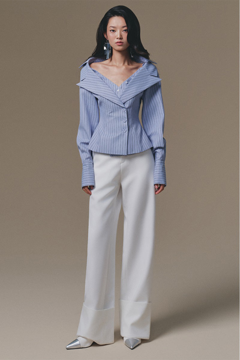 White Selena pants by Keira Tong, stylish women's pants with a relaxed fit and clean design, shown on a model.