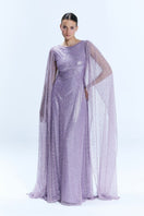 Nur Karaata La Mamounia purple gown featuring elegant fabric and detailed design, perfect for formal occasions.