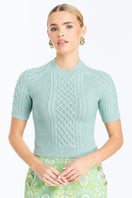 Mestiza New York Enya Sweater in Sea Glass with a cozy knit texture and relaxed fit, featuring a soft, pastel green color.