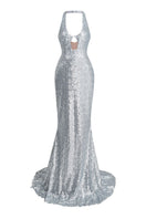 Shimmering goddess gown by Le Thanh Hoa featuring elegant flowing fabric and intricate detailing, perfect for formal occasions.