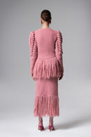Pink fringe midi skirt by Liya, featuring flowing fabric and stylish fringe detailing perfect for trendy fashion looks.