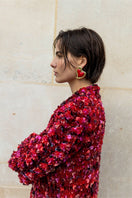 Liya Heartfelt red earrings with heart-shaped design, featuring vibrant red color and elegant dangle style.