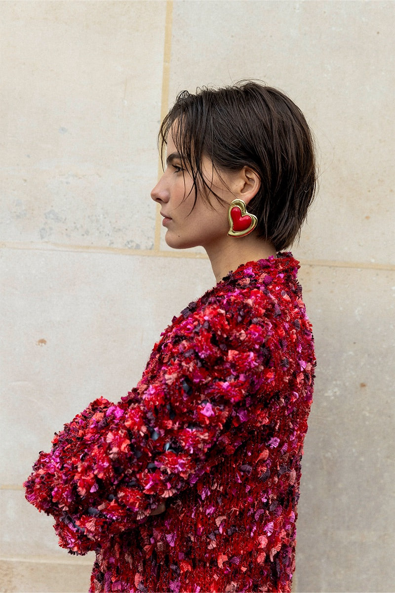 Liya Heartfelt red earrings with heart-shaped design, featuring vibrant red color and elegant dangle style.