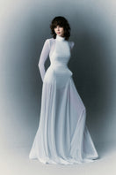 White Plan Nirvana Dress gown with flowing fabric and elegant design, showcased on a mannequin.