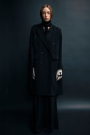 Black Vaska long coat with zip-on detachable scarf, stylish and warm outerwear, shown on a model.