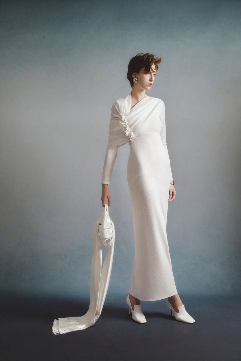 White Plan Celeste draped maxi dress featuring flowing fabric and elegant design, perfect for formal or summer occasions.