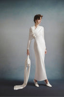 White Plan Celeste draped maxi dress featuring flowing fabric and elegant design, perfect for formal or casual occasions.