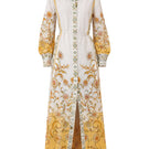 Yellow Raishma Briar maxi dress with flowing fabric and sleeveless design, styled for elegant summer occasions.