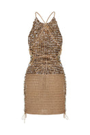 Hand-crocheted Mirel Prentice mother of pearl mini dress displayed on a model, showcasing intricate pattern and elegant design.