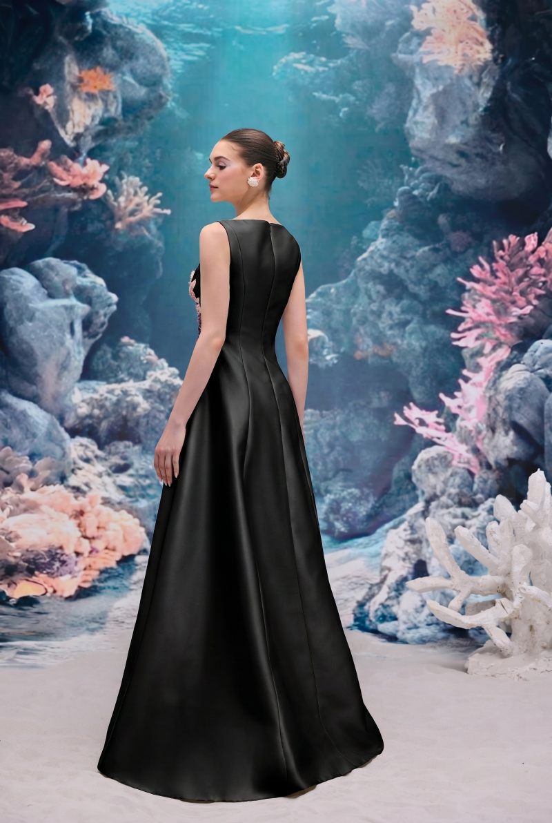 Black Evelina Royal Taffeta gown by 21Six, showcasing a sleek, elegant evening dress with flowing fabric and sophisticated design.
