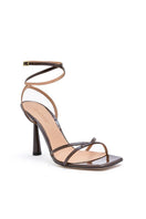 Kolane Kim sandal in chocolate brown with open toe design and ankle strap, featuring a stylish and comfortable slip-on style.