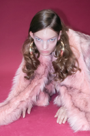 Sudi Etuz faux fur coat with attached scarf, stylish winter jacket featuring plush fur material and a cozy design.