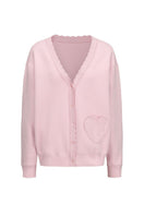 Nana Jacqueline Carrie pink cardigan with a relaxed fit, button-front design, and soft knit fabric, styled with a casual outfit.