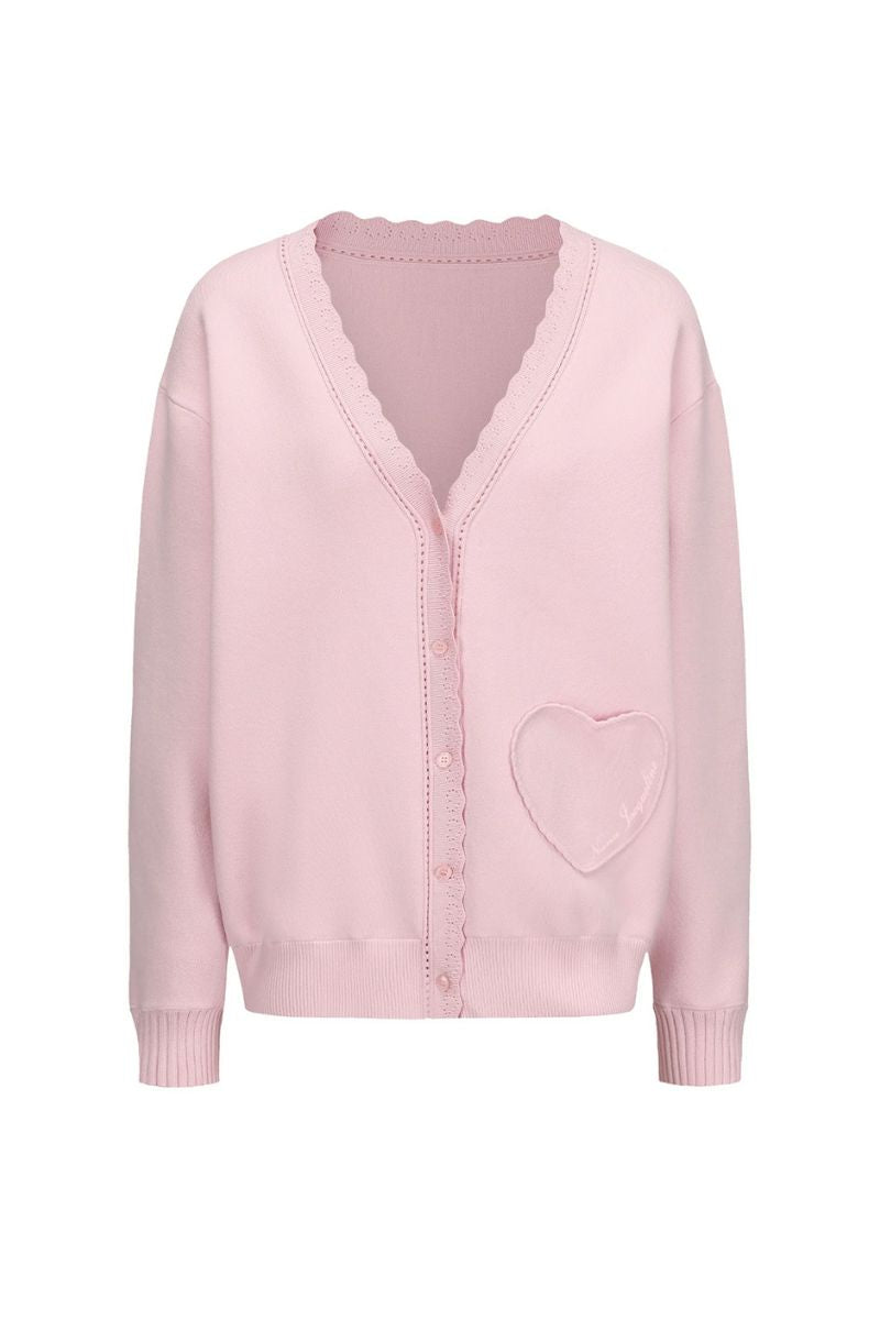 Nana Jacqueline Carrie pink cardigan with a relaxed fit, button-front design, and soft knit fabric, styled with a casual outfit.