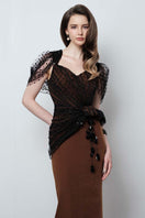 Elegant Do Long Urban Muse gown with flowing fabric and stylish design, perfect for formal occasions.