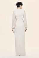 Nihan Peker NAVİGLİ gown featuring elegant fabric with intricate detailing and a flowing silhouette.
