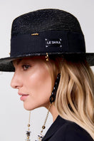 Black fedora hat by LE SH KA with decorative shells and 24K gold-plated accessories, stylish and elegant headwear.